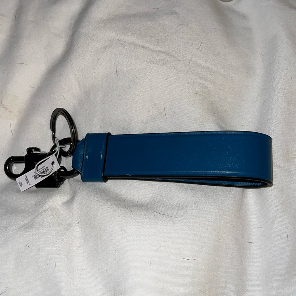 NWT Coach clip on keychain blue.